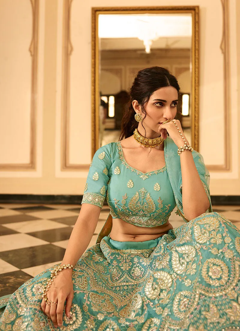 Teal Blue Golden Embroidered Organza Lehenga Choli