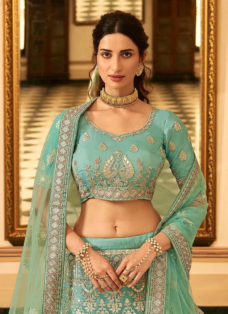 Teal Blue Golden Embroidered Organza Lehenga Choli