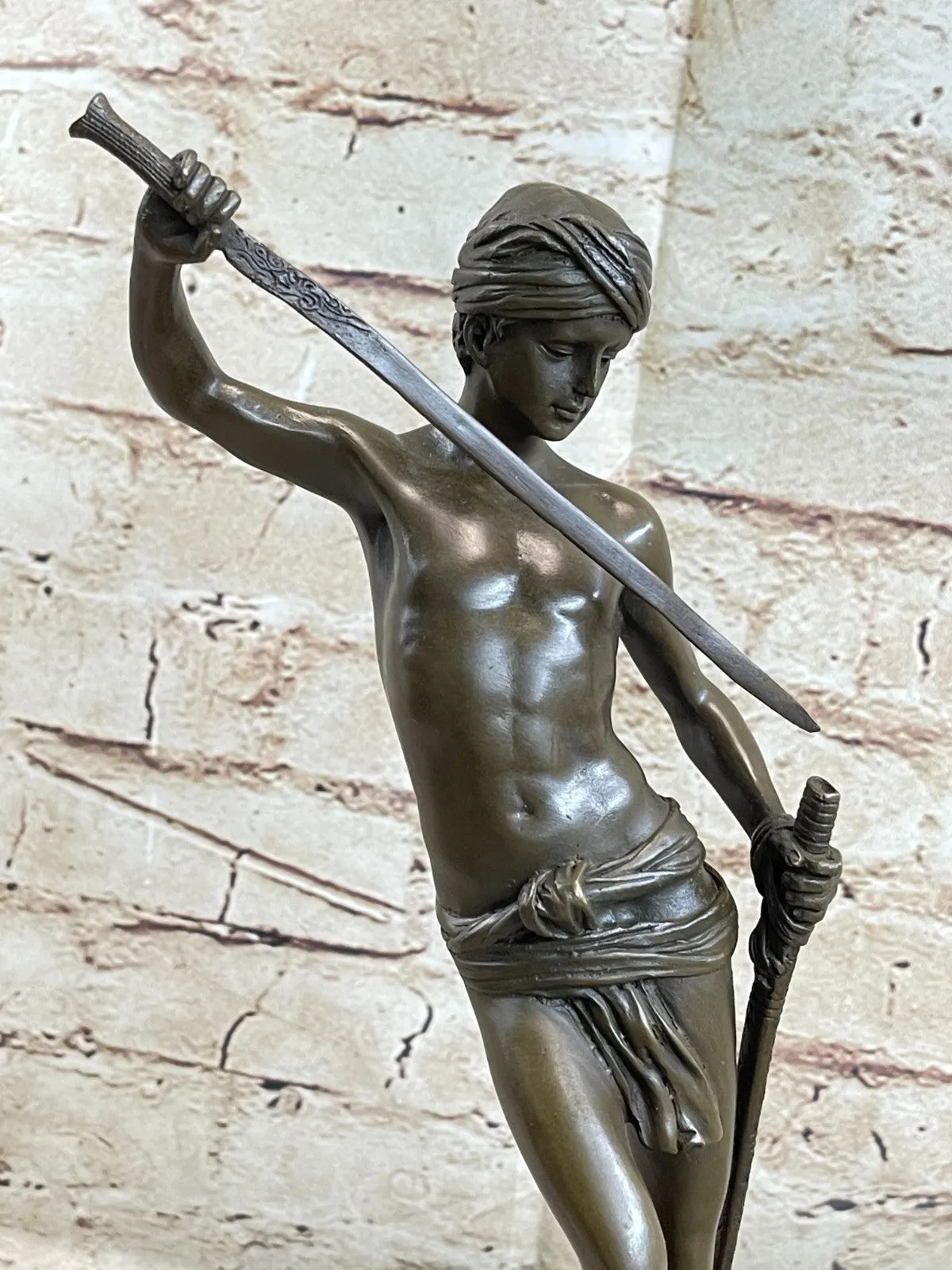 Turn of century bronze statue representing David and Goliath. Signed "A. Mercie